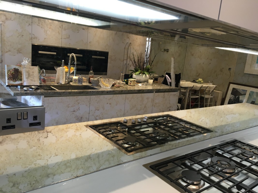 Mirror glass splashback in Esher luxury kitchen